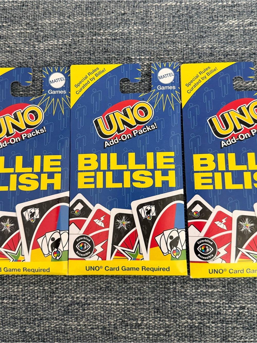 Mattel UNO Billie Eilish Add-On Pack - Blue, Yellow, Red, Black